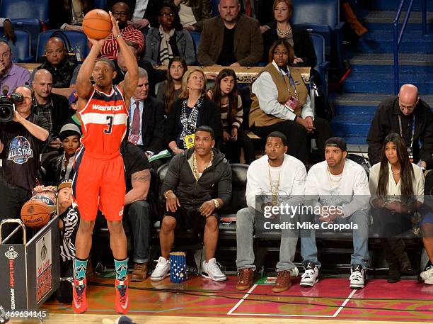 Nelly and Drake attend the Foot Locker Three-Point Contest at the State Farm All-Star Saturday Night during the NBA All-Star Weekend 2014 at The...