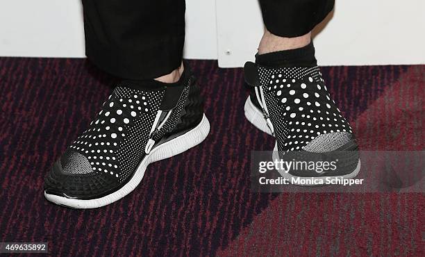Adam Derry, Creative Director at Ekocycle for will.i.am & The Coca-Cola Company, shoe detail, attends the W Hotels Collaboration With will.i.am &...