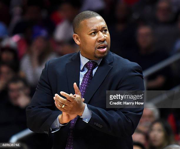 Melvin Hunt of the Denver Nuggets cheers on his team during the first half against the Los Angeles Clippers at Staples Center on April 13, 2015 in...