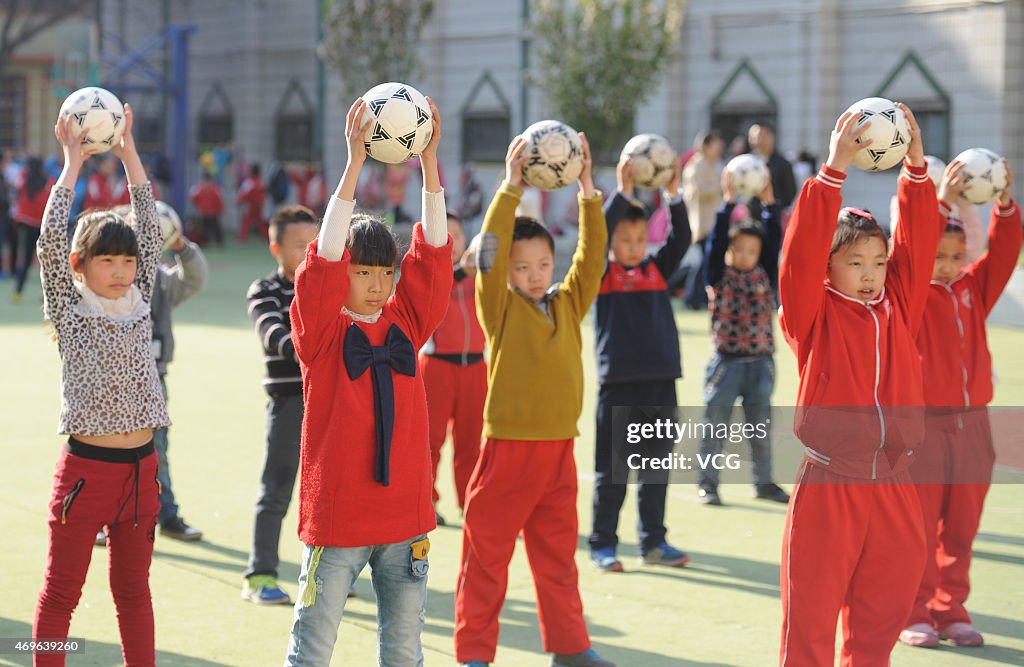 Students practice Football Calisthenics In Taiyuan