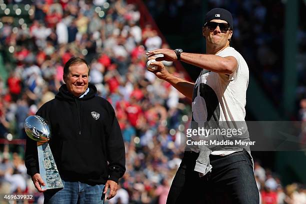 New England Patriots quarterback Tom Brady throws the first pitch before the game between the Boston Red Sox and the Washington Nationals as New...