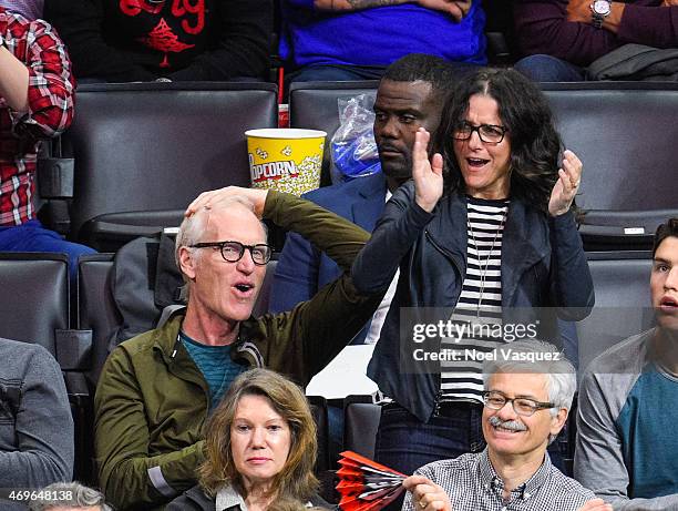 Julia Louis-Dreyfus and Brad Hall attend a basketball game between the Denver Nuggets and the Los Angeles Clippers at Staples Center on April 13,...