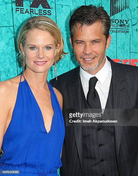Actress Joelle Carter and actor Timothy Olyphant attend the premiere of FX's 'Justified' series finale at ArcLight Cinemas Cinerama Dome on April 13,...