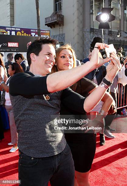 Actor Hal Sparks and Samsung Ambassador pose for a selfie using the new Samsung Galaxy S 6 edge at the release of "Avengers: Age Of Ultron" at Dolby...