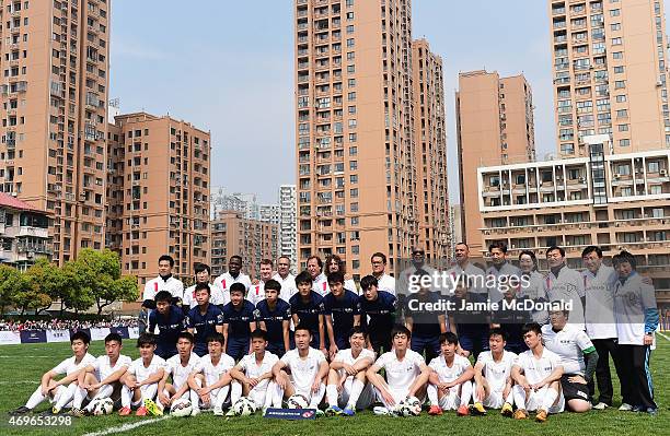 Laureus Chairman Edwin Moses poses with Academy members and ambassadors including Alexey Nemov, Daley Thompson, Fabio Capello, Ruud Gullit, former...