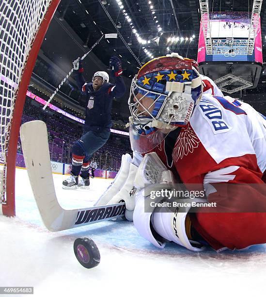 Phil Kessel of the United States celebrates after teammate Cam Fowler scored a goal on Sergei Bobrovski of Russia in the second period during the...