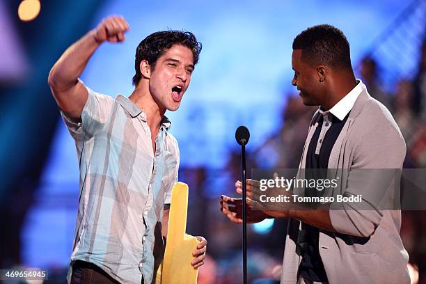 Actor Tyler Posey and NFL player Randall Cobb of the Green Bay Packers speak onstage during the 4th Annual Cartoon Network Hall Of Game Awards held...