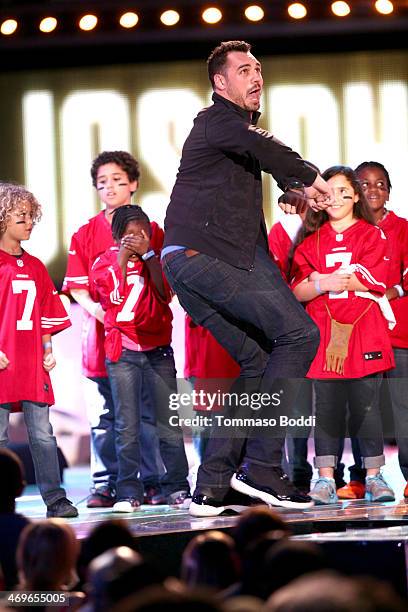 Player Joseph Fauria of the Detroit Lions accepts the Dance Machine award onstage during the 4th Annual Cartoon Network Hall Of Game Awards held at...