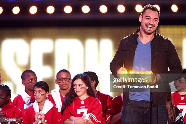 Player Joseph Fauria of the Detroit Lions accepts the Dance Machine award onstage during the 4th Annual Cartoon Network Hall Of Game Awards held at...