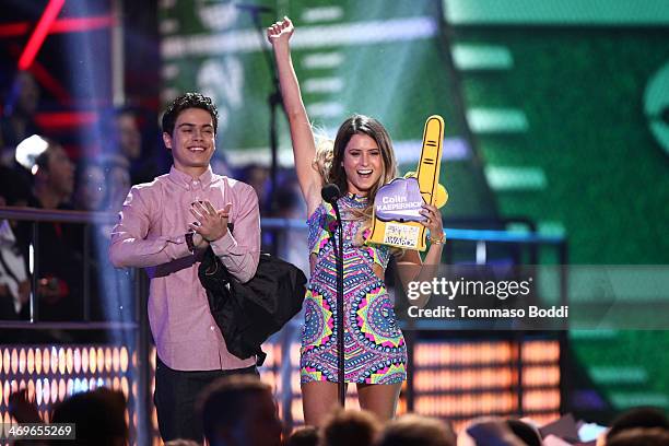 Actor Jake T. Austin and surfer Anastasia Ashley speak onstage during the 4th Annual Cartoon Network Hall Of Game Awards held at the Barker Hangar on...