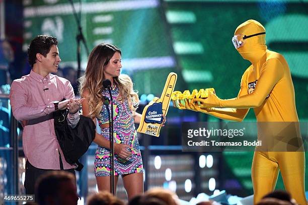 Actor Jake T. Austin and surfer Anastasia Ashley speak onstage during the 4th Annual Cartoon Network Hall Of Game Awards held at the Barker Hangar on...