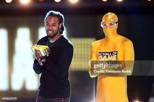 Player Richard Sherman of the Seattle Seahawks accepts the Captain Clutch award onstage during the 4th Annual Cartoon Network Hall Of Game Awards...