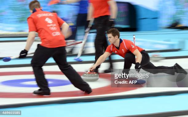 Great Britain's Scott Andrews trows the stone during the Men's Curling Round Robin Session 10 against Norway at the Ice Cube Curling Center during...