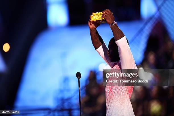 Football player Chris Davis accepts the Whoa-ment award onstage during the 4th Annual Cartoon Network Hall Of Game Awards held at the Barker Hangar...