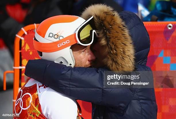 Morgan Miller comforts her husband Bode Miller of the United States during the Alpine Skiing Men's Super-G on day 9 of the Sochi 2014 Winter Olympics...