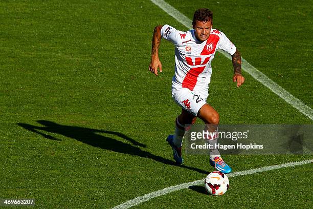 Nick Kalmar of the Heart runs the ball during the round 19 A-League match between Wellington Phoenix and Melbourne Heart at Westpac Stadium on...