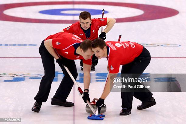 Greg Drummond, Michael Goodfellow and Scott Andrews of Great Britain in action during the Curling Men's Round Robin match between Great Britain and...
