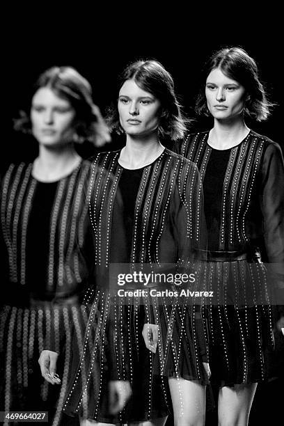 Model showcases designs by Teresa Helbig on the runway at Teresa Helbig show during Mercedes Benz Fashion Week Madrid Fall/Winter 2014 at Ifema on...