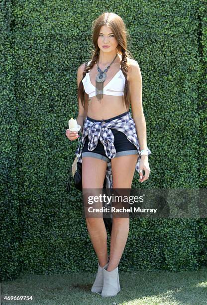 Music fan Natalie Clay wearing a necklace from a botique in Puerto Rico and braids attends the 2015 Coachella Valley Music and Arts Festival -...