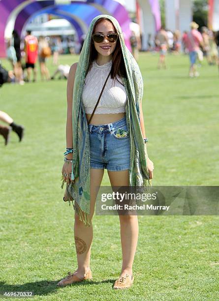 Music fan Camaray Davalos wearing a Free People top and personal family scarf gifted to her attends the Coachella Valley Music and Arts Festival -...