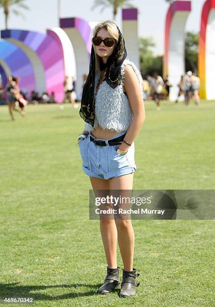 Music fan attends wearing a vintage vest from Plato's Closet during the Coachella Valley Music and Arts Festival - Weekend 1 at The Empire Polo Club...