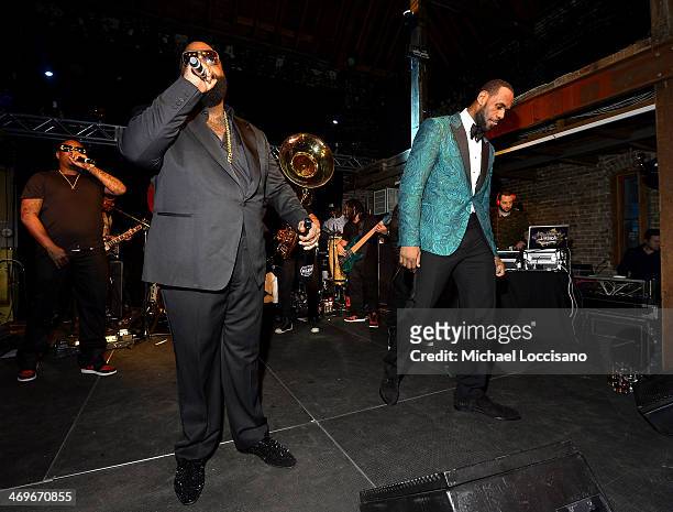 Rapper Rick Ross and NBA Player LeBron James perform with The Roots at GQ & LeBron James NBA All Star Party Sponsored By Samsung Galaxy And Beats at...