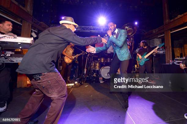 Rapper Juvenile and NBA Player Lebron James perform onstage with The Roots at GQ & LeBron James NBA All Star Party Sponsored By Samsung Galaxy And...