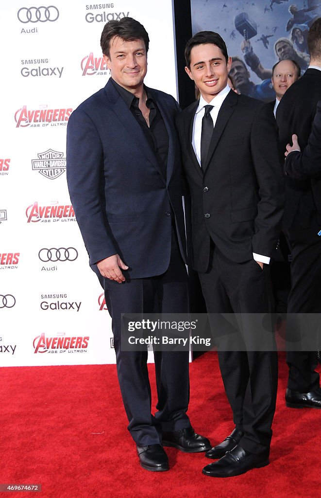 Actor Nathan Fillion and his son arrive at the Premiere Of Marvel's