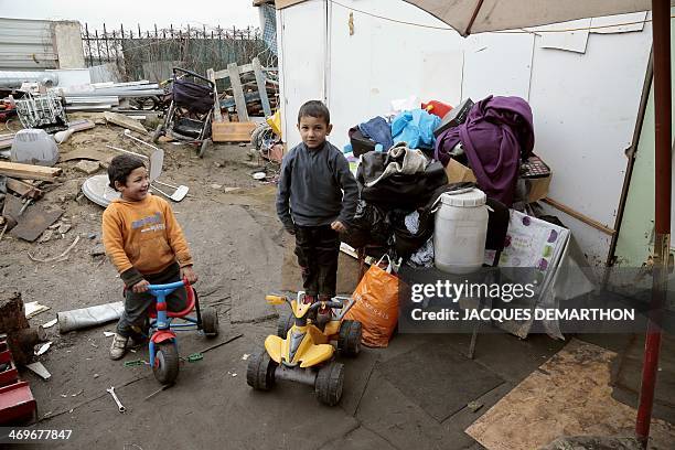 Photo taken on January 31, 2014 shows Roma children at a camp in Villeneuve-Saint-Georges, in the southeastern suburbs of Paris, which benefits from...