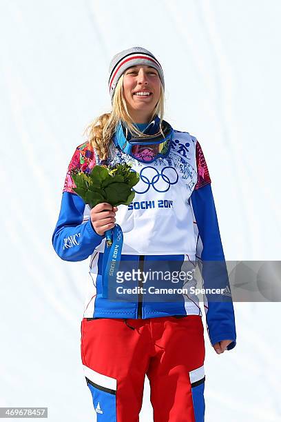 Bronze medalist Chloe Trespeuch of France celebrates during the flower ceremony for the Ladies' Snowboard Cross Finals on day nine of the Sochi 2014...