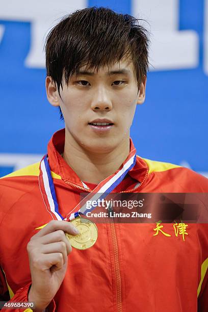 Li Xiang of China celebrates on the podium after the Men's 200 meters breaststroke final on day six of the China National Swimming Championships on...