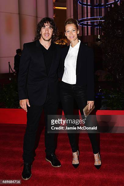 Model Vanessa Lorenzo and Laureus Ambassador Carles Puyol arrive for the Laureus World Sports Awards 2015 Welcome Party at the Pearl Tower on April...