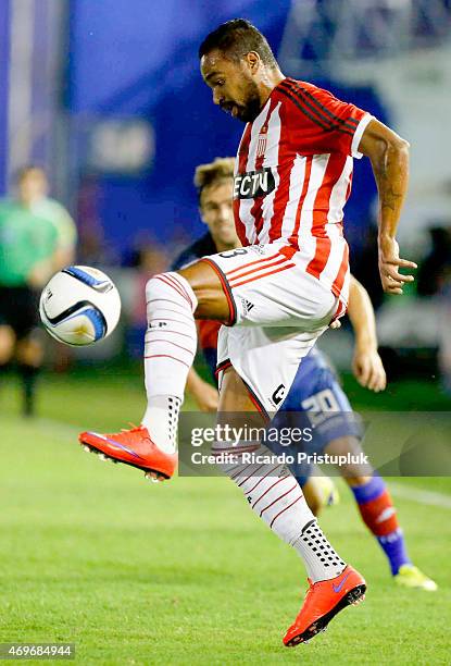 Alvaro Pereira of Estudiantes controls the ball during a match between Tigre and Estudiantes as part of 9th round of Torneo Primera Division at Jose...