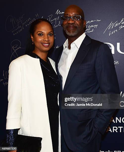 Laureus Chairman Edwin Moses and Michelle Moses arrive for the Laureus World Sports Awards 2015 Welcome Party at the Pearl Tower on April 14, 2015 in...