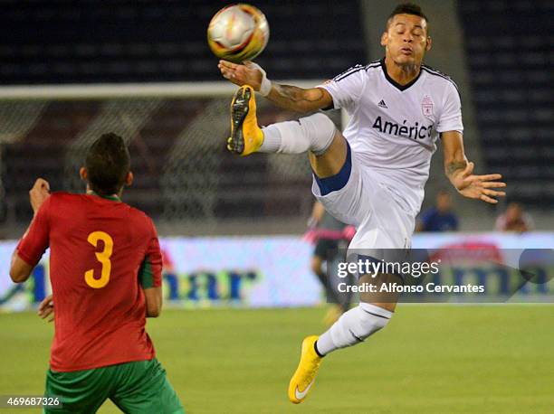 Kevin Sandoval of Barranquilla and Ayron Del Valle of America de Cali fight for the ball during a match between Barranquilla FC and America de Cali...