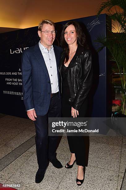 Laureus World Sports Academy member Mika Hakkinen and guest arrive for the Laureus World Sports Awards 2015 Welcome Party at the Pearl Tower on April...