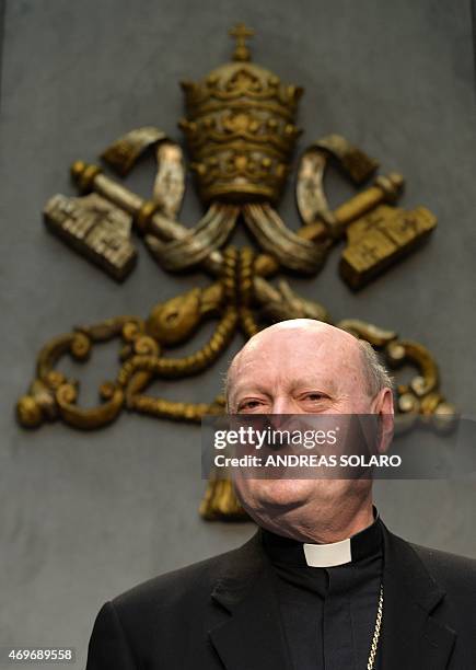 Italian cardinal Gianfranco Ravasi looks on during a press conference for the presentation of the Holy See pavilion "Non di solo pane" at the EXPO...