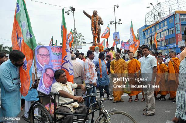 Followers along with members of various parties like BJP and AAP paying tribute to Dr BR Ambedkar on his birth anniversary on April 14, 2015 in...