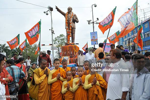 Followers along with members of various parties like BJP and AAP paying tribute to Dr BR Ambedkar on his birth anniversary on April 14, 2015 in...