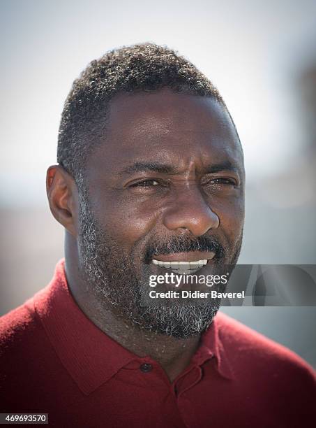 Idris Elba poses during the 'Mandela, My Dad And Me' photocall at MIPTV on April 14, 2015 in Cannes, France.