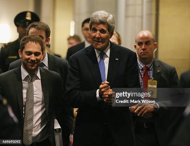 Secretary of State John Kerry walks through the halls of Congress between meetings with lawmakers on Capitol Hill, April 14, 2015 in Washington, DC....