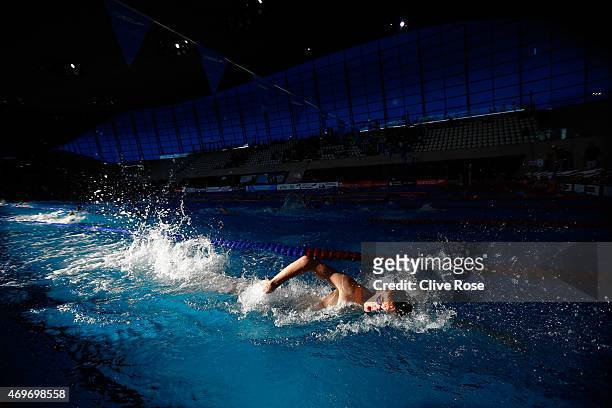 Competitors warm up prior to competition on day one of the British Swimming Championships at the London Aquatics Centre on April 14, 2015 in London,...