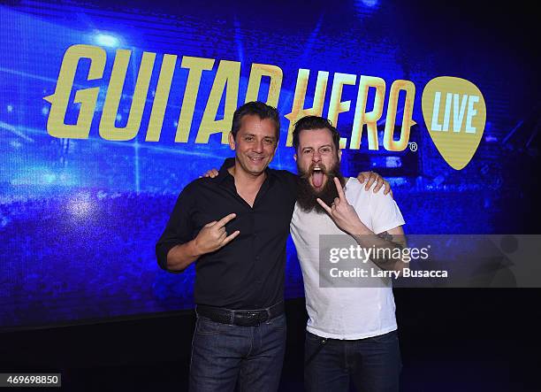 Eric Hirshberg, CEO of Activision Publishing and Jamie Jackson, creative director and co-head of freestyle attend the revealing of the All-New Guitar...