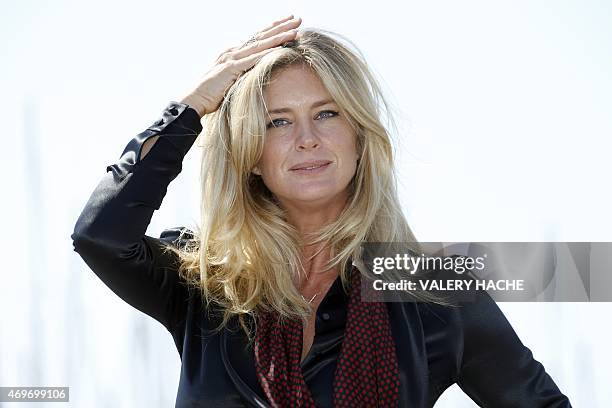 New Zealand's actress Rachel Hunter poses for a photocall for the serie "Rachel's tour of beauty" during the MIPTV , on April 14, 2015 in Cannes, on...
