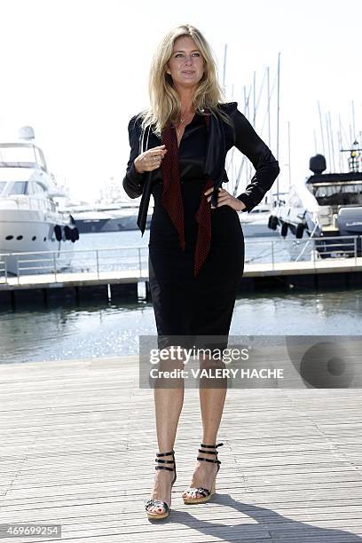 Rachel Hunter poses for a photocall for the serie "Rachel's tour of beauty" during the MIPTV, on April 14, 2015 in Cannes, on the French Riviera. AFP...