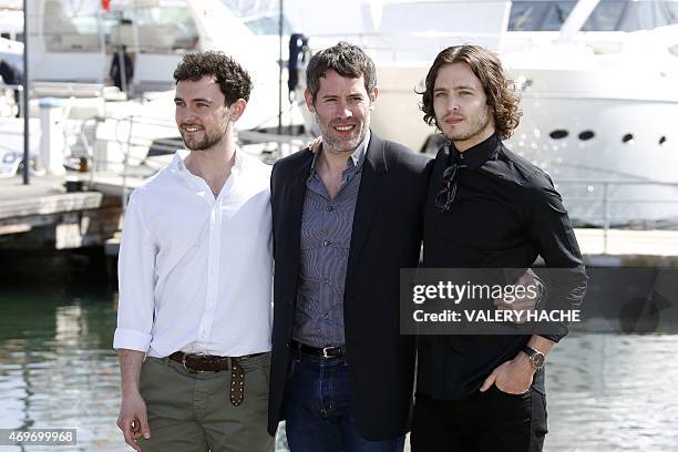 English actor Georges Blagden, French director Jalil Lespert and Welsh actor Alexander Vlahos pose during a photocall for the series "Versailles"...