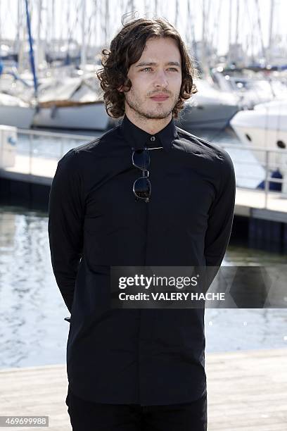 Welsh actor Alexander Vlahos poses during a photocall for the series "Versailles" during the MIPTV , in Cannes, on the French Riviera, on April 14,...