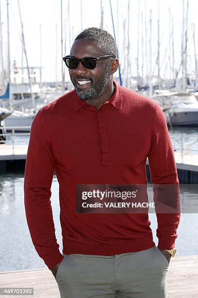 British actor Idris Elba poses during a photocall for the series "Mandela, my dad and me" during the MIPTV , in Cannes, on the French Riviera, on...