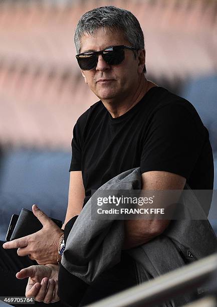Father of Barcelona's player Lionel Messi, Jorge Horacio Messi, attends a training session of Barcelona at the Parc des Princes stadium in Paris on...