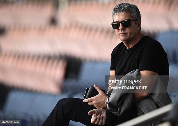 Father of Barcelona's player Lionel Messi, Jorge Horacio Messi, attends a training session of Barcelona at the Parc des Princes stadium in Paris on...